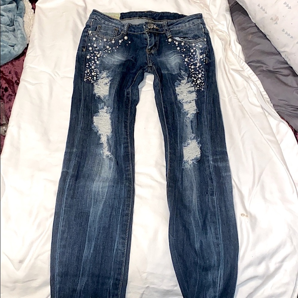 Size 26 Women’s Machine inc. jeans.